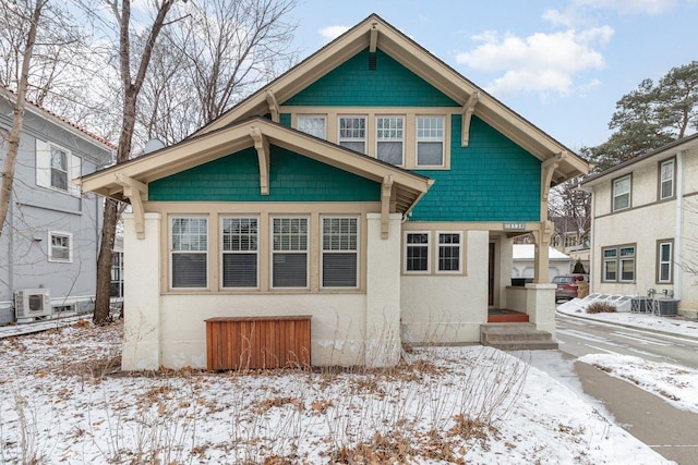 bungalow featuring ac unit and central AC