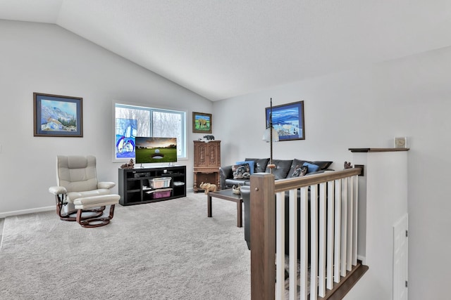 living room featuring vaulted ceiling and carpet flooring