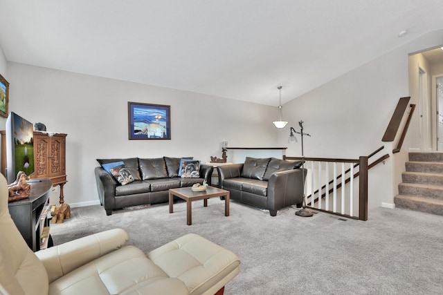 living room featuring baseboard heating and light colored carpet