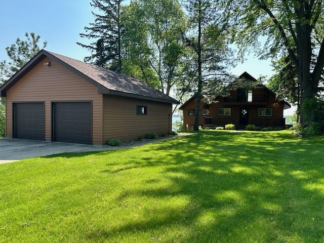 6451 Stardust Ln NE, Carlos Twp, MN 56308 - view of side of property with a detached garage, an outdoor structure, and a yard