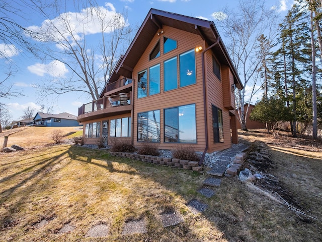 6451 Stardust Ln NE, Carlos Twp, MN 56308 - back of property with a balcony and a lawn