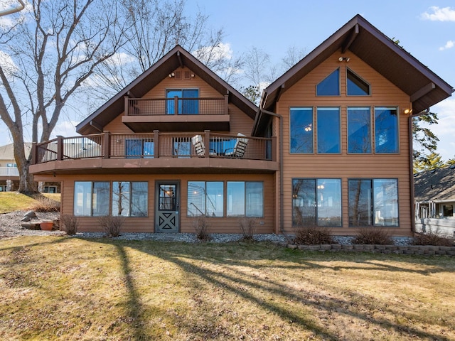 6451 Stardust Ln NE, Carlos Twp, MN 56308 - back of property featuring a balcony and a lawn