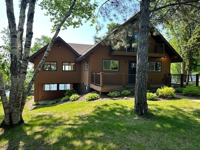 6451 Stardust Ln NE, Carlos Twp, MN 56308 - back of house with a deck and a yard