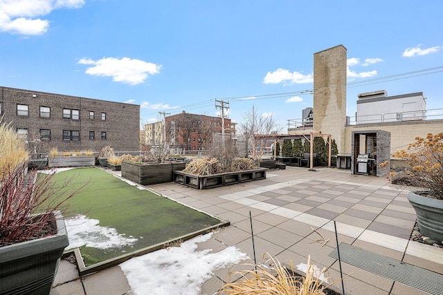 surrounding community with a patio area