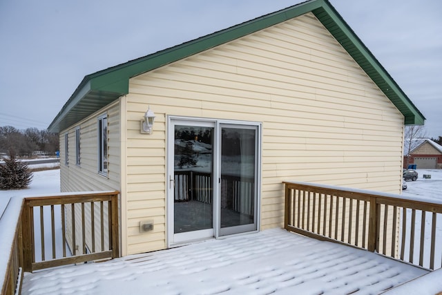 view of snow covered deck