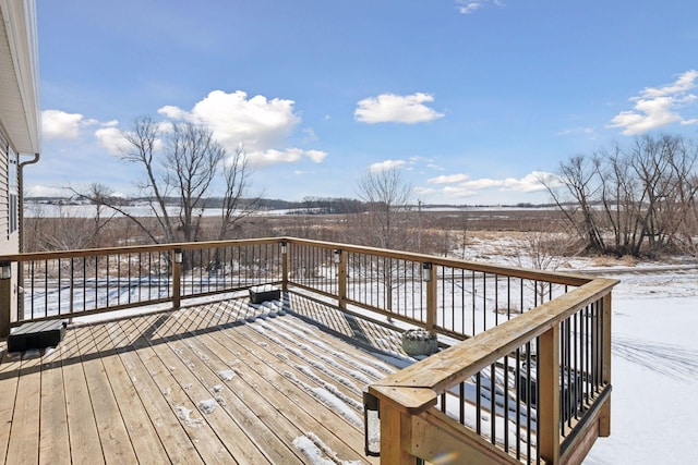 view of snow covered deck