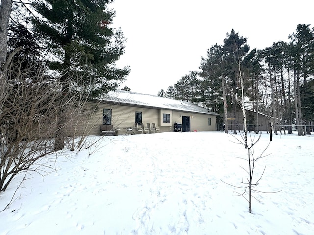 view of snow covered property