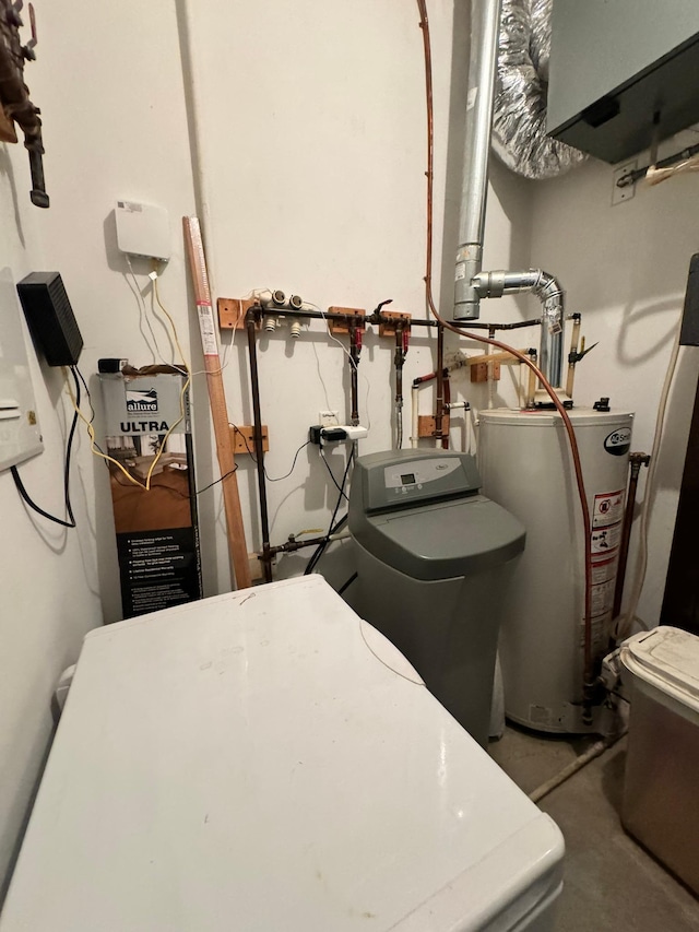 utility room featuring gas water heater