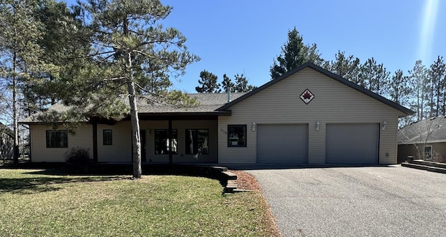 1119 Timbers Dr, Park Rapids, MN 56470 - ranch-style house with a garage, a front lawn, and driveway