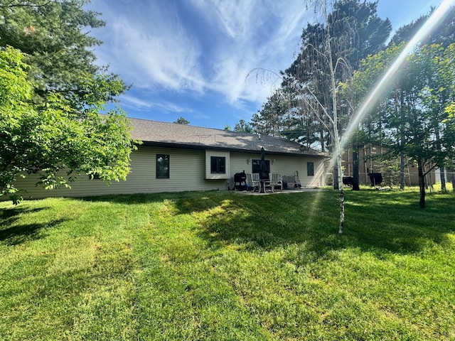 1119 Timbers Dr, Park Rapids, MN 56470 - rear view of house with a patio