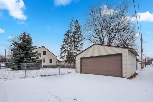 view of snow covered garage