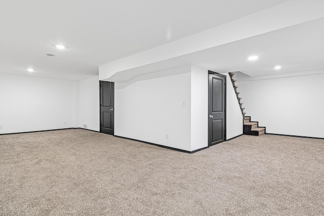 basement with carpet flooring