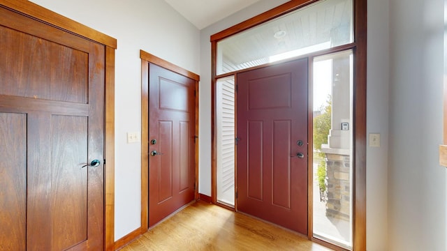 foyer entrance featuring light wood-type flooring