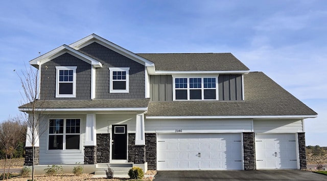 craftsman-style home featuring a garage