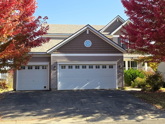 craftsman-style house with a garage