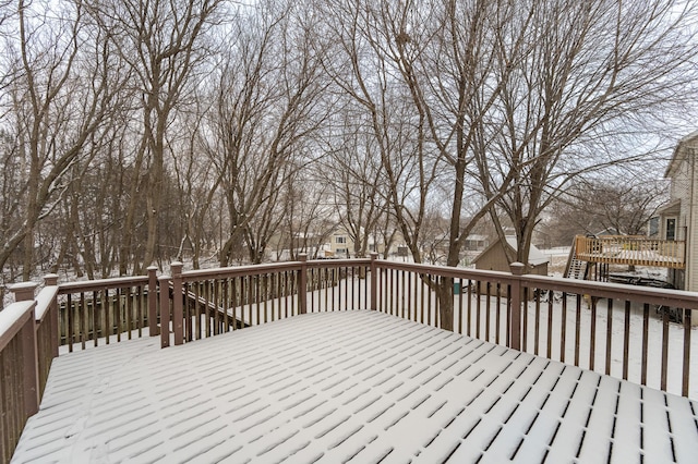 view of snow covered deck