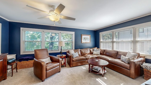 carpeted living room featuring crown molding, plenty of natural light, and ceiling fan