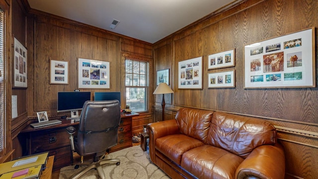 home office featuring wood walls