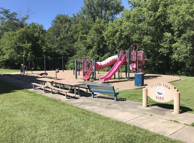 view of jungle gym with a yard