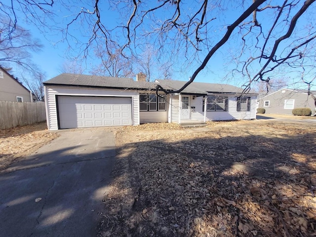 ranch-style house featuring a garage