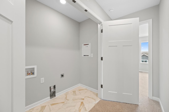 clothes washing area with washer hookup and electric dryer hookup