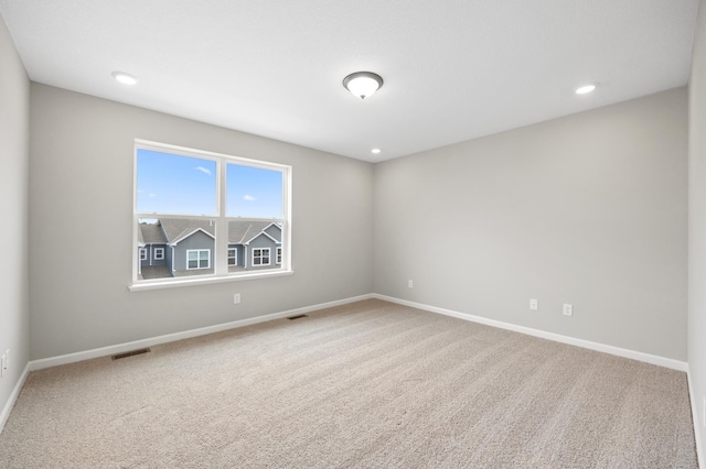 view of carpeted spare room