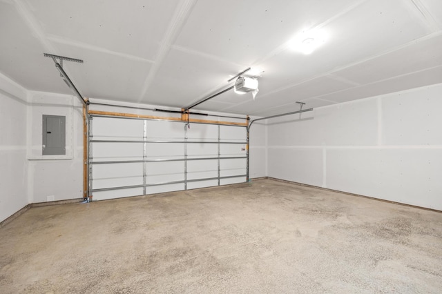 garage featuring a garage door opener and electric panel