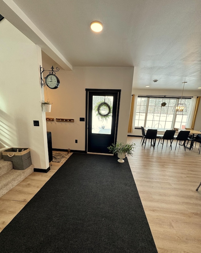 entrance foyer with light hardwood / wood-style floors