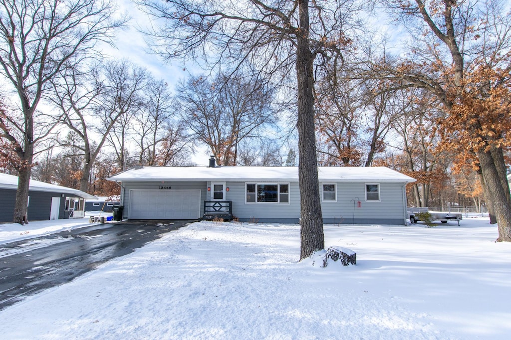 single story home with a garage