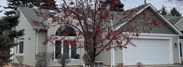 view of front of property featuring a garage