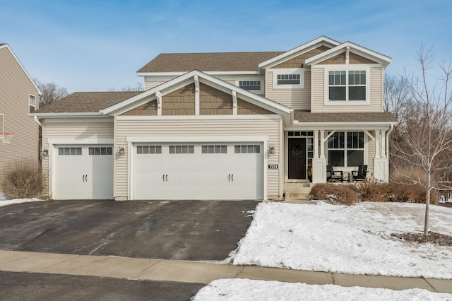 craftsman inspired home with a garage