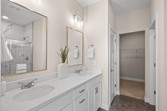 bathroom featuring vanity and walk in shower