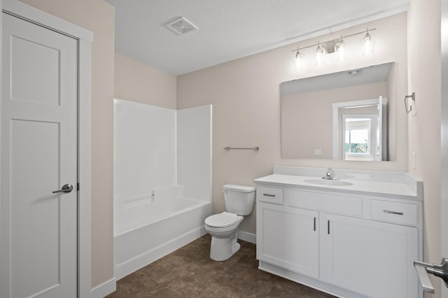 full bathroom featuring vanity, a textured ceiling, washtub / shower combination, and toilet