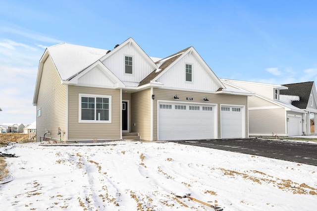 view of front of property featuring a garage