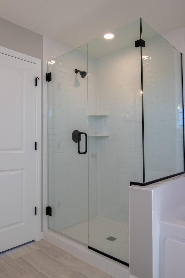 full bath featuring a stall shower