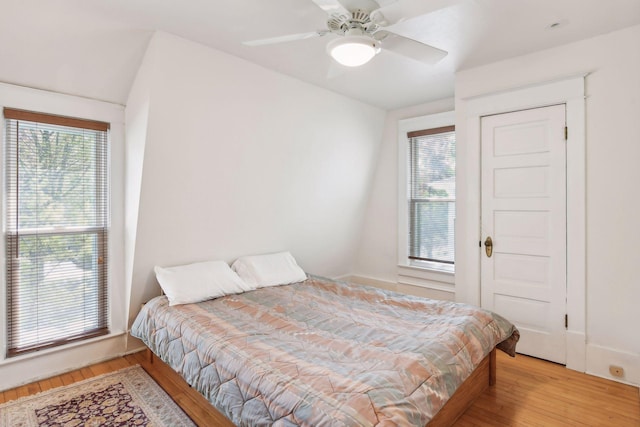 bedroom featuring ceiling fan and light wood-style flooring