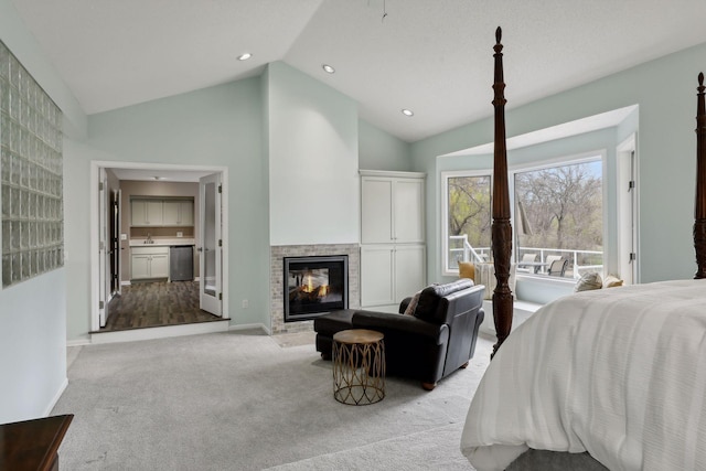 bedroom with light colored carpet and high vaulted ceiling