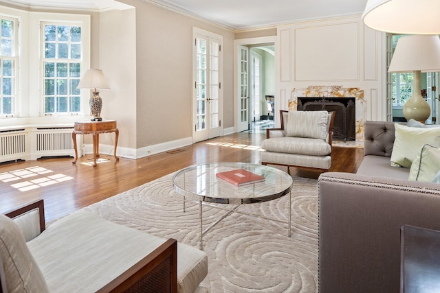 interior space featuring a healthy amount of sunlight and ornamental molding