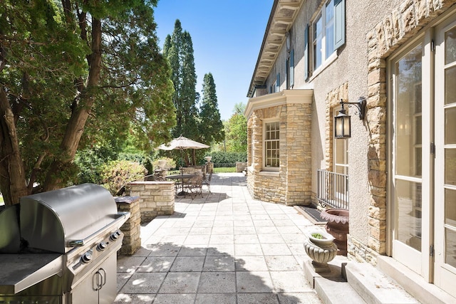 view of patio / terrace featuring a grill