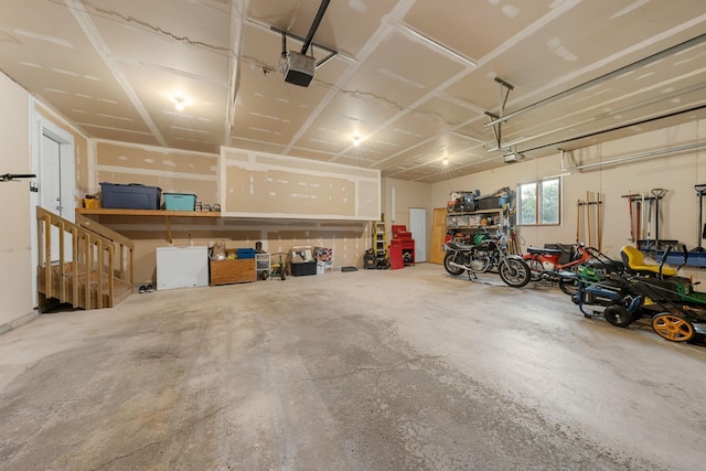 garage featuring a garage door opener