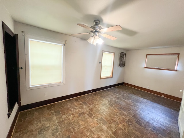 spare room featuring ceiling fan