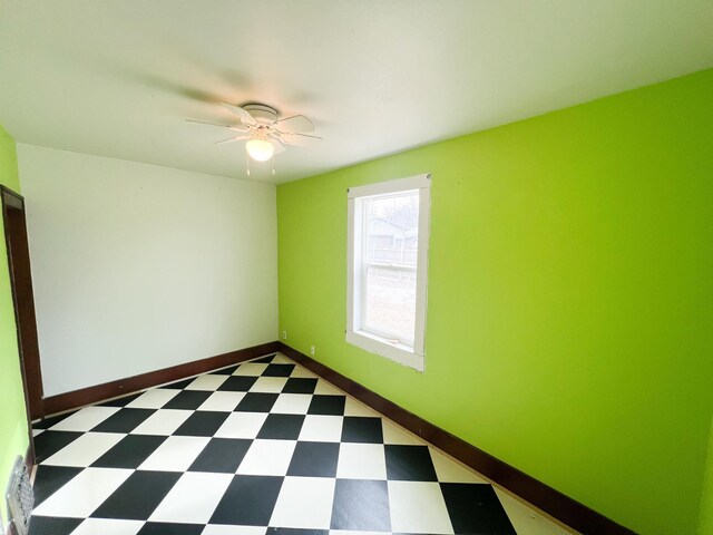 unfurnished room featuring ceiling fan