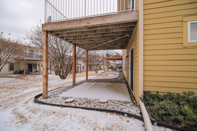 view of snow covered patio