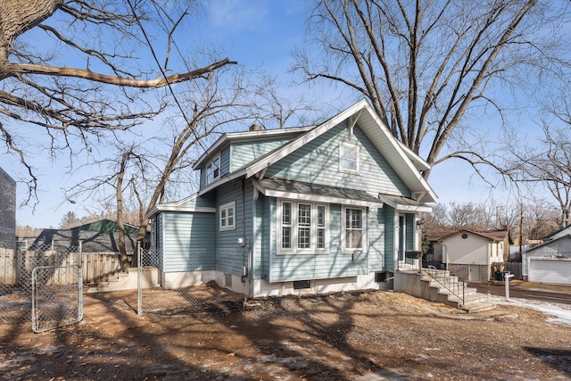 view of front of property with a chimney and fence