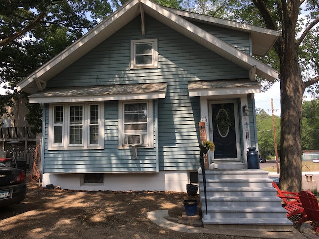 view of front of home with entry steps