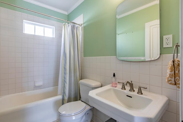 full bathroom featuring toilet, sink, shower / tub combo, tile walls, and ornamental molding