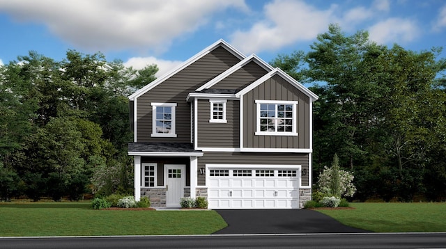 view of front facade with a garage and a front lawn