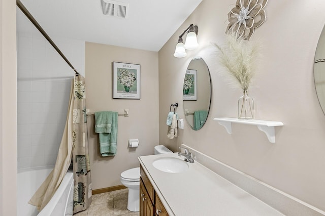 full bathroom featuring tile patterned floors, vanity, toilet, and shower / bath combo