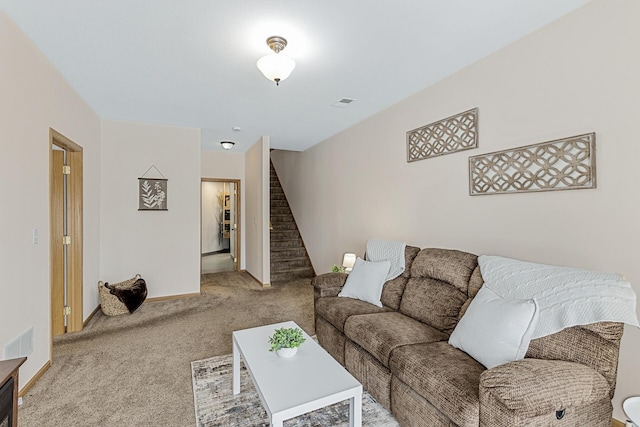 living room featuring light carpet