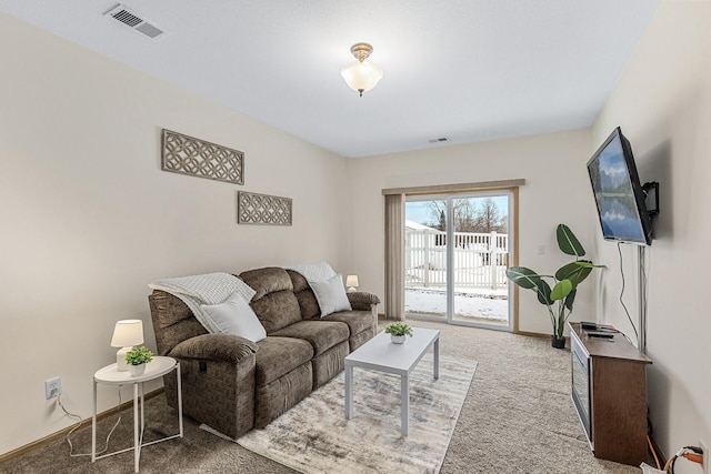 living room featuring light colored carpet